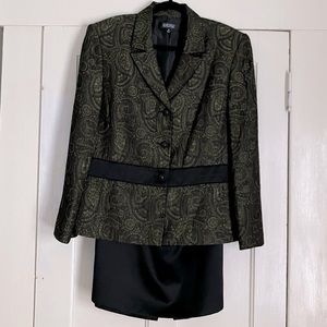 Beautiful green and black woman’s suit. Never worn.